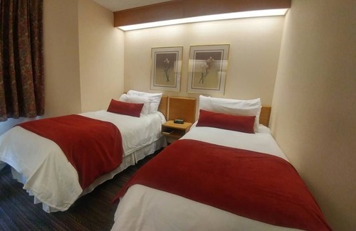 New Minas Hotel | Slumber Inn