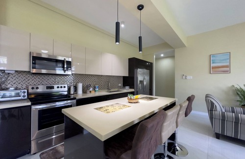 Saint Andrew Condo | Smurfs Pad @ Mont Charles. Stylish 2-BDR Condo in a Prime Location in Kingston.