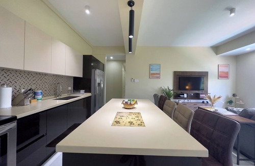 Saint Andrew Condo | Smurfs Pad @ Mont Charles. Stylish 2-BDR Condo in a Prime Location in Kingston.
