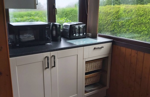 Bronaber Cabin | SNOWDONIA LOG CABIN RETREAT. 4/6 BERTH FAMILY/PET FRIENDLY. MOUNTAIN VIEWS