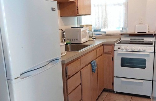 West End House | Sonscape Sandy Beachfront Guest Suite 100 feet from the ocean!