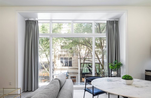 Rittenhouse Row Apartment | Sosuite | Corner 1BR Apt w Laundry, Workspace