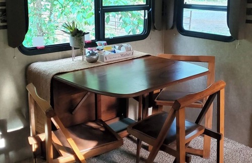 Muse RV Rental | South Creekside Camper @ Heaven's Gate RV and Retreat