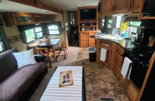 Muse RV Rental | South Creekside Camper @ Heaven's Gate RV and Retreat