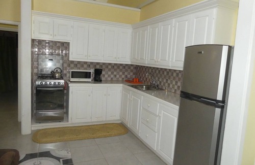 Laborie Apartment | Southern Comfort at its best! Family suite overlooking quaint village street.