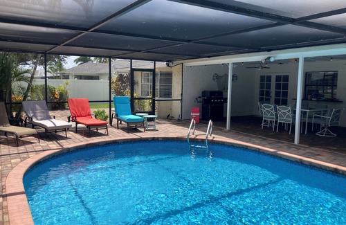 Caloosahatchee House | Spacious 3-bedroom home with backyard oasis, private heated pool, close to beach