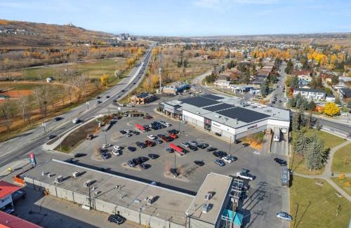 Montgomery House | Spacious 4-Bedroom Retreat Near Bow River with Foosball & National Park Pass