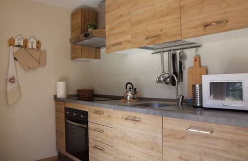 Bionaz Apartment | Spacious and bright studio apartment with large windows and a beautiful view of the mountains.