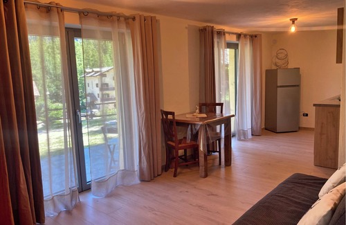 Bionaz Apartment | Spacious and bright studio apartment with large windows and a beautiful view of the mountains.
