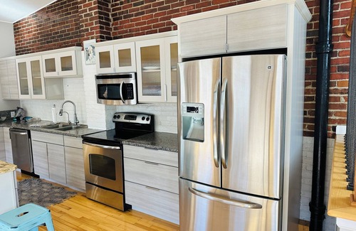 Logansport House | Spacious and luxurious downtown loft in Logansport w/incredible rooftop patio