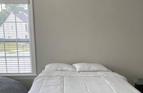 Fuquay-Varina House | Spacious Bedroom with Private Bathroom