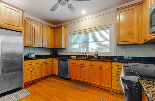 Plantation House | Spacious dog-friendly home with elevator, screened decks, on-site pool, & gym