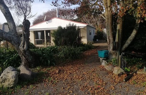 Waitara Cottage | Spacious Garden Cottage w/woodburner