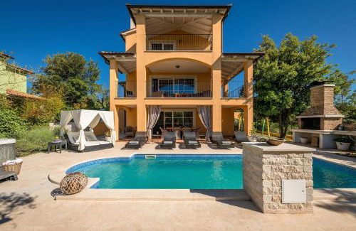 Rakalj House | Spacious holiday house - pool/jacuzzi/sauna/playground/8+2