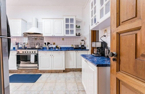 Anahuac House | Spacious Home with BBQ, Outdoor Dining & Workspace