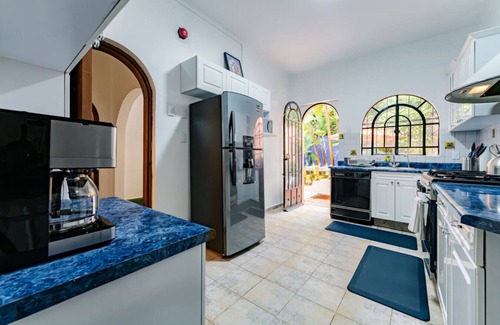 Anahuac House | Spacious Home with BBQ, Outdoor Dining & Workspace