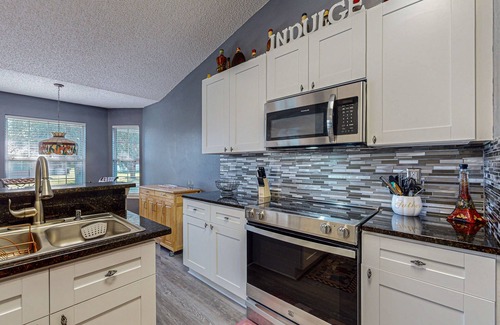 Indian Trails House | Spacious home with saltwater pool, gas grill, patio, & washer/dryer