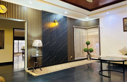 Lahore House | “Spacious King Rooms Prime DHA Location Perfect for Business & Family Stays