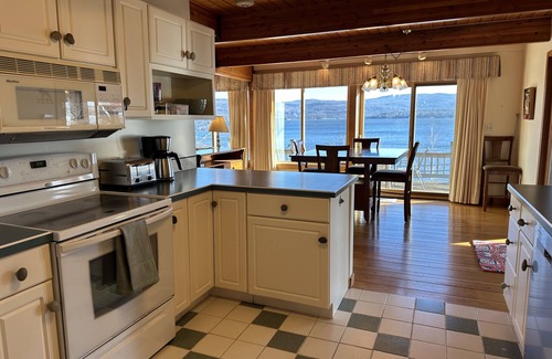 Hebron House | Spacious Lake Home & Ski Retreat - game room, large decks, and gathering space!