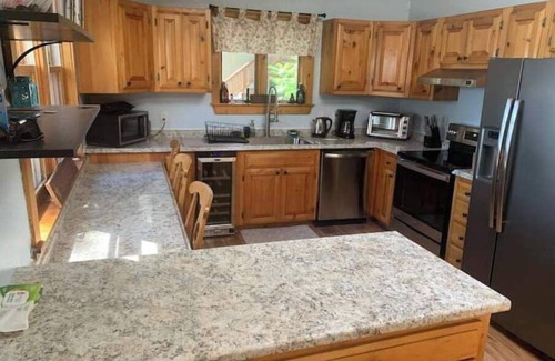 Farmington House | Spacious lakefront home with 5 bedrooms & hot tub!