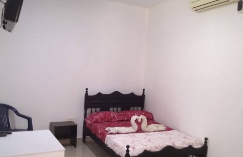 Sur Oriente House | Spacious room with air conditioning and private bathroom