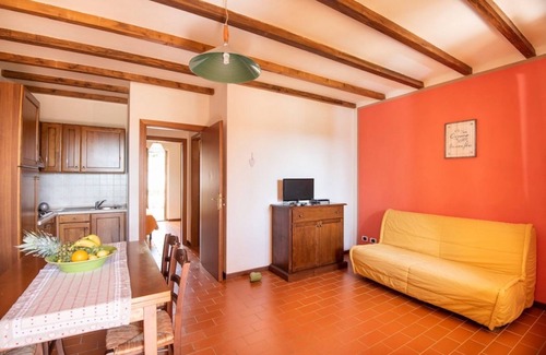 Suvereto Apartment | Spacious two-room apartments (about 45 sq m), featuring a large living room with equipped kitchenette and double sofa bed, double bedroom and bathroom with shower. Large covered first floor balcony.They are also equipped with:Bed linen and towels,dis