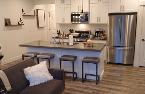 Pinebrook House | Spacious Townhome Centrally Located, Pet Friendly, Hot Tub & Bonus Basement Room