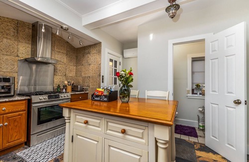 Dubuque House | Spanish Revival 1920 Home in Quiet Neighborhood