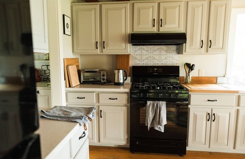 Orange House | Spectacular home on 60 acres, swimming pond & trails, pet friendly + EV charger