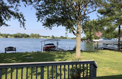Coldwater Cottage | Spectacular sunset views and north chain lake front red cottage rental