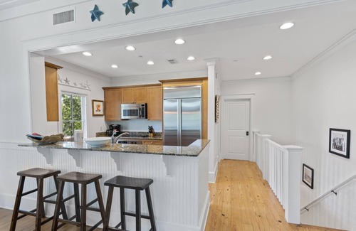 Beach District Condo | Spend Fall With Us! Short Walk to Beach Club! Views of Western Lake! Outdoor Porch Space!