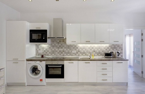 Tower Road Apartment | Splendid Apartment, Steps Away from the Sea