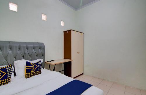 Dumai Hotel | SPOT ON 92797 Awi Stay Syariah Near SIMPANG KAWASAN INDUSTRI WILMAR PELINTUNG