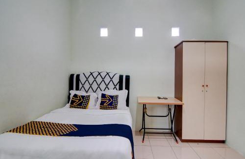 Dumai Hotel | SPOT ON 92797 Awi Stay Syariah Near SIMPANG KAWASAN INDUSTRI WILMAR PELINTUNG