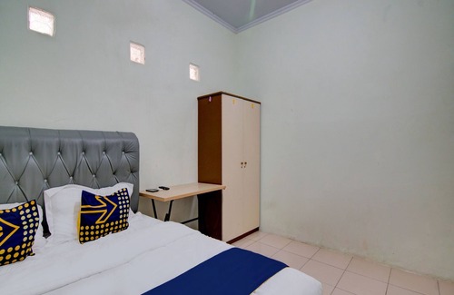 Dumai Hotel | SPOT ON 92797 Awi Stay Syariah Near SIMPANG KAWASAN INDUSTRI WILMAR PELINTUNG