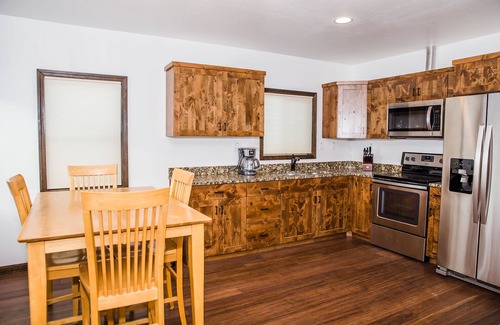 Freedom Cabin | Spotted Moon Ranch - River Front - One Bedroom King Cabin
