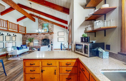 Centralia House | Sprawling and colorful lakefront home with patio