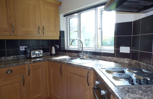 Laugharne Cottage | SPRING GARDEN COTTAGE, pet friendly, with open fire in Laugharne