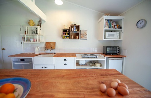 Frasertown Cottage | Stable Cottage; awaken to the sound of a river flowing over rapids.