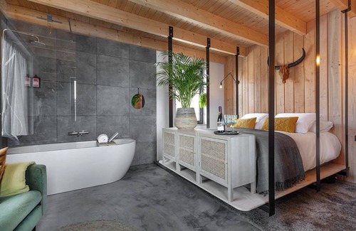 Veessen House | Stay in a romantic country style love suite with authentic trusses