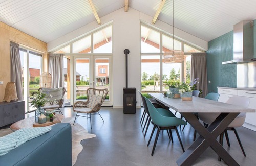 Akkrum House | Stay in our energy-neutral Eneva 6 bungalow with private jetty.