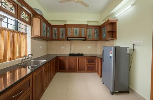 Arpookara Apartment | Stay Near Carithas & Matha Blue Bells by Haritha homes