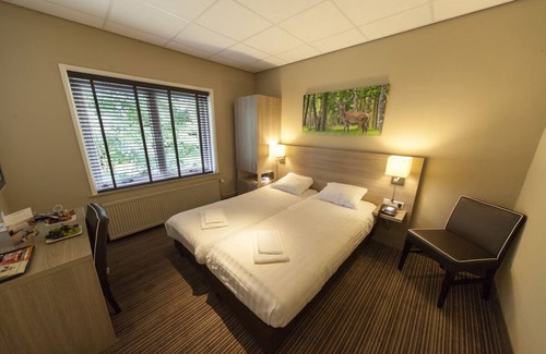 Beekbergen-West Hotel | Stay Steps from Historic Steam Train and Scenic Forest Routes! Onsite Dining!