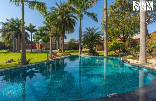 Faridabad Villa | StayVista at Palash Van Luxury 3BR Villa in Faridabad New Delhi with Bonfire, Pool, Wi-Fi
