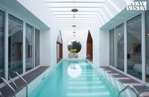 Suntikoppa Villa | StayVista at Reflection by The Woods - Breakfast Included