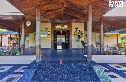 Jabalpur Villa | StayVista at Riverfront Cottage with Scenic River view, BBQ, Bonfire, Gazebo, Pet friendly