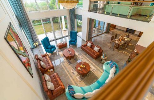 Gurugram Villa | StayVista at Serenity Farms with Pool, Lawn, Bonfire & BBQ