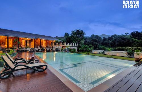 Udaipur District Villa | StayVista at The Earthen Boutique with Spacious Pool, Terrace, Lawn & Games
