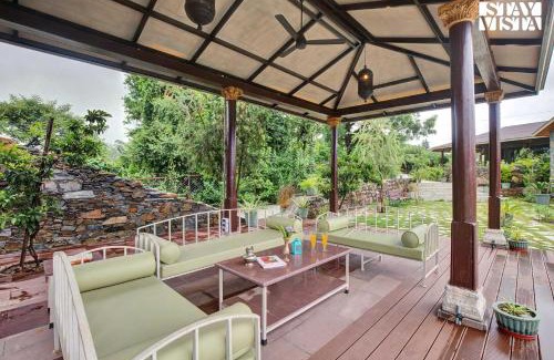 Udaipur District Villa | StayVista at The Earthen Boutique with Spacious Pool, Terrace, Lawn & Games