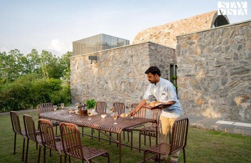 Rajawas Villa | StayVista at The Stone Age Home with Pool, Lawn, BBQ & Bonfire